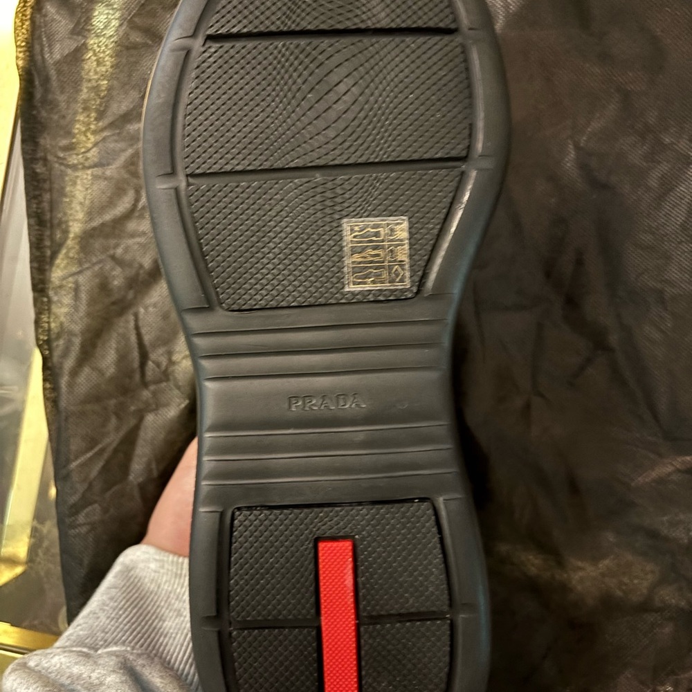 Prada Black and Red Loafers with Textured Sole